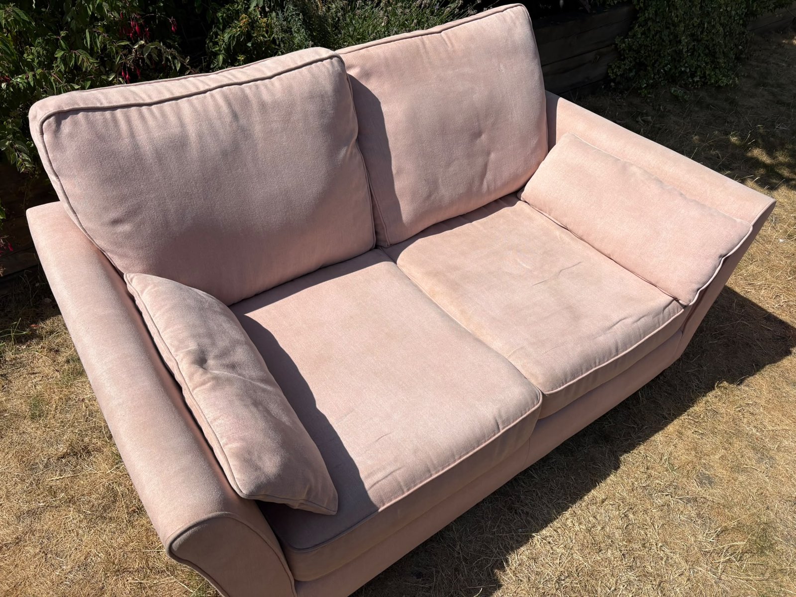 Two-seater fabric sofa, after cleaning